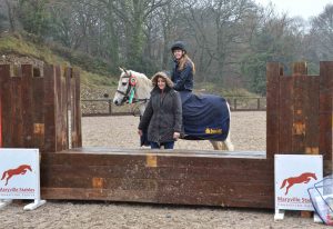 Claire Nulty (Bucas) congratulates Carina Crowley and Spider - Winners of the Bucas Maryville Spring Derby Cross 70cm Final (29/01/17)